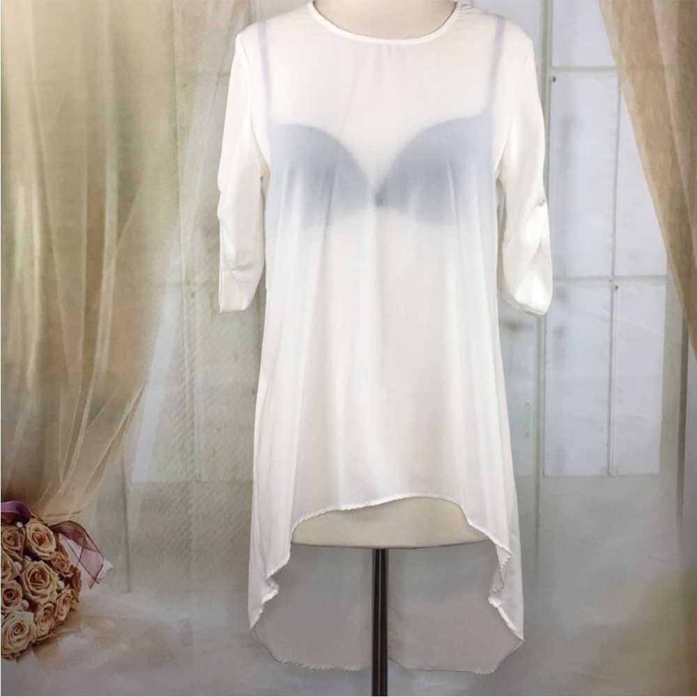 FUN & Flirt Open Back Sheer Blouse
Short Sleeved M